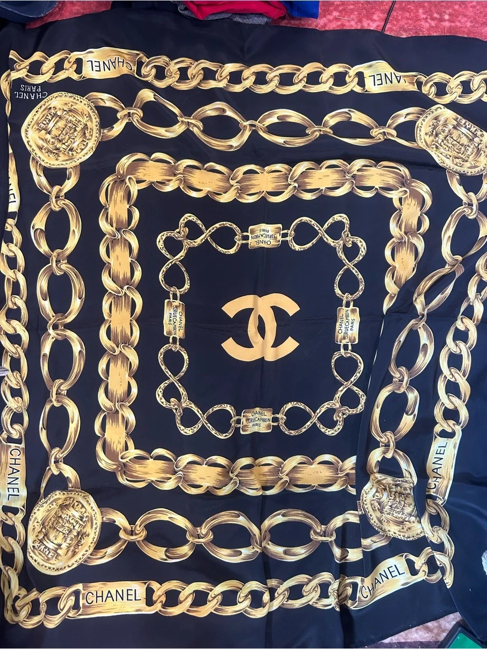 CHANEL Black and Gold Silk Scarf with Chain Motif